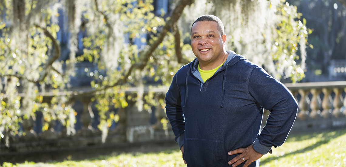 Man smiling outdoors